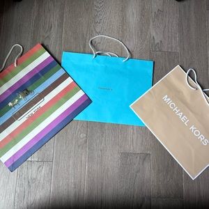 Bundle three medium size shopping bags Coach, Tiffany & Co.